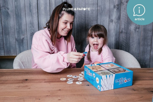 partage maman et fille autour d'un jeu éducatif